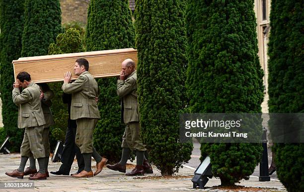 The coffin arrives for a Requiem Mass for Hugh van Cutsem who passed away on September 2nd 2013 at Brentwood Cathedral on September 11, 2013 in...