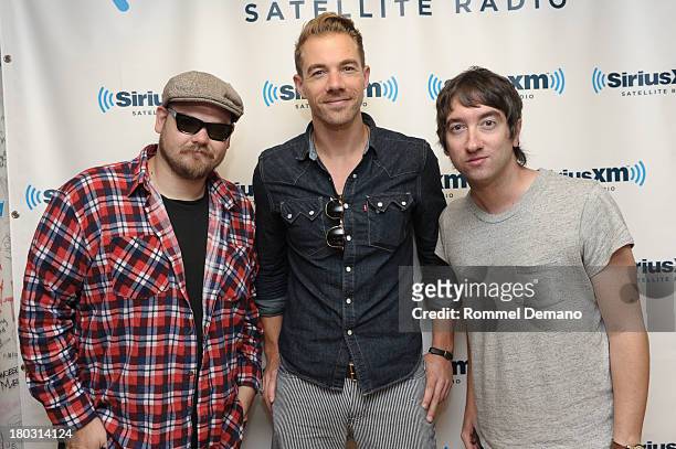 Mike Retondo, Tim Lopez and Tom Higgenson of Plain White T's visit SiriusXM Studios on September 11, 2013 in New York City.