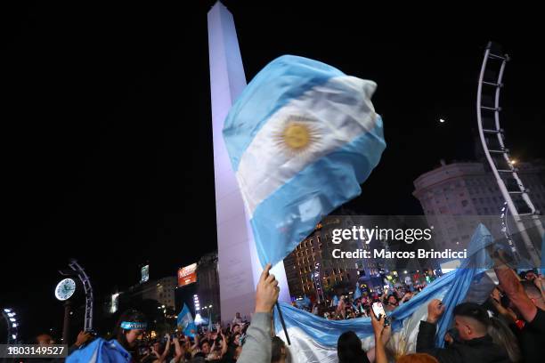 Supporters of newly elected President of Argentina Javier Milei of La Libertad Avanza celebrate after the polls closed in the presidential runoff on...