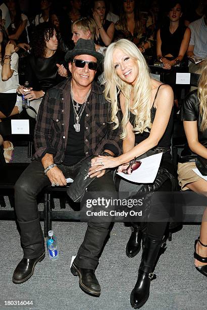 Musician Neal Schon and Michaele Salahi attend the Rachel Zoe fashion show during Mercedes-Benz Fashion Week Spring 2014 at The Studio at Lincoln...