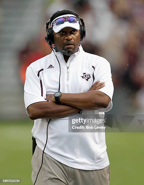 Head coach Kevin Sumlin of the Texas A&M Aggies looks on against the Sam Houston State Bearkats at Kyle Field on September 7, 2013 in College...