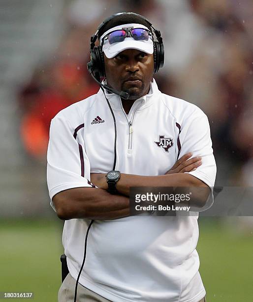 Head coach Kevin Sumlin of the Texas A&M Aggies looks on against the Sam Houston State Bearkats at Kyle Field on September 7, 2013 in College...