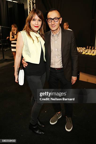 Musician Keren Ann and designer Gilles Mendel pose backstage at the J. Mendel fashion show during Mercedes-Benz Fashion Week Spring 2014 at The...