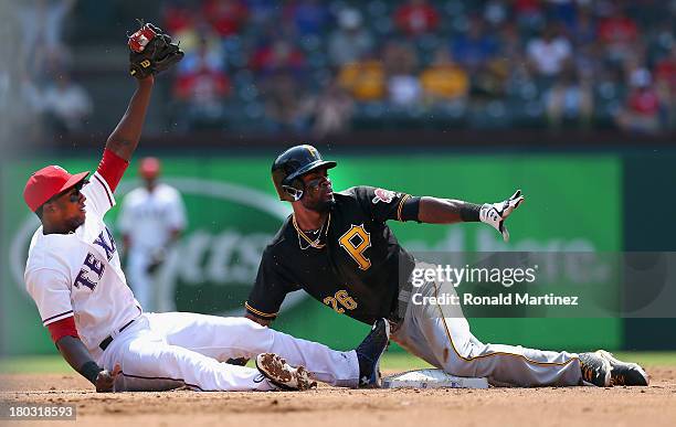 Felix Pie of the Pittsburgh Pirates steals second base against Jurickson Profar of the Texas Rangers at Rangers Ballpark in Arlington on September...