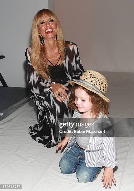 Designer Rachel Zoe with son Skyler Berman attend the Rachel Zoe show during Spring 2014 Mercedes-Benz Fashion Week at The Studio at Lincoln Center...