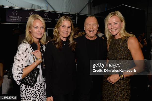 Lauren Dupont, Aerin Lauder, designer Michael Kors and Renee Rockefeller backstage at the Michael Kors fashion show during Mercedes-Benz Fashion Week...