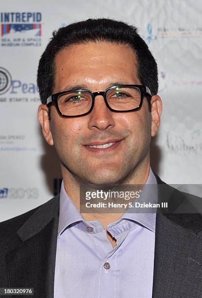 Adam Schefter attends the 2013 Cantor Fitzgerald And BGC Partners Charity Day at Cantor Fitzgerald on September 11, 2013 in New York City.