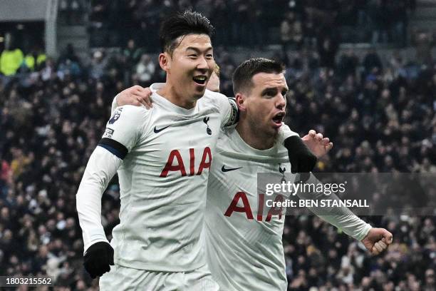 Tottenham Hotspur's Argentinian midfielder Giovani Lo Celso celebrates with Tottenham Hotspur's South Korean striker Son Heung-Min after scoring his...