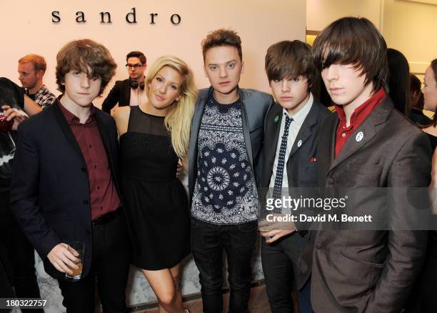 Ellie Goulding and Conor Maynard pose with Pete O'Hanlon, Josh McClorey and Ross Farrelly of The Strypes at the Sandro London flagship store launch...
