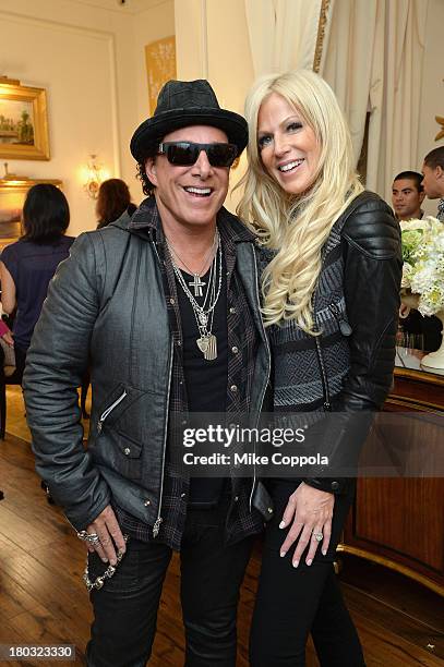 Musician Neal Schon and fiancé Michaele Salahi attend the Mercedes-Benz Star Lounge during Mercedes-Benz Fashion Week Spring 2014 on September 11,...