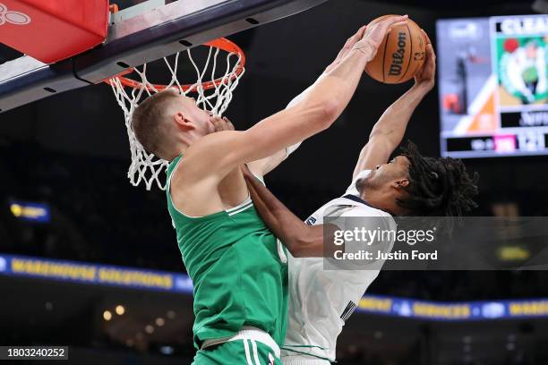 Ziaire Williams of the Memphis Grizzlies goes to the basket against Kristaps Porzingis of the Boston Celtics during the second half at FedExForum on...