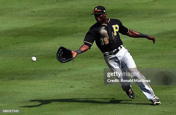 Felix Pie of the Pittsburgh Pirates fields a single by Elvis Andrus of the Texas Rangers in the seventh inning at Rangers Ballpark in Arlington on...