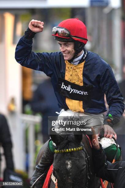 Kildare , Ireland - 26 November 2023; JJ Slevin on Fastorslow celebrates winning the John Durkan Memorial Punchestown Steeplechase on day two of the...