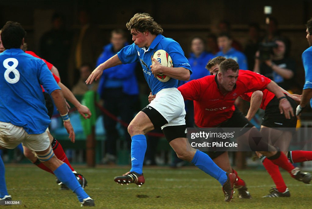 Mirco Bergamasco of Italy and Leigh Davies of Wales