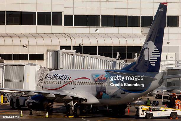 Grupo Aeromexico SAB plane sits on the tarmac at Los Angeles International Airport in Los Angeles, California, U.S., on Friday, Sept. 6, 2013. Yields...