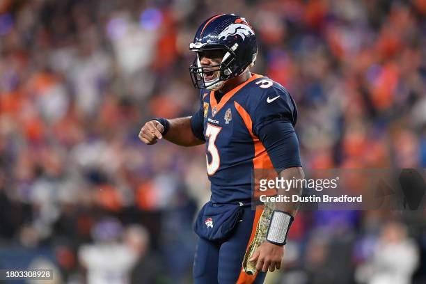Quarterback Russell Wilson of the Denver Broncos reacts during the fourth quarter of the NFL game Minnesota Vikings at Empower Field At Mile High on...