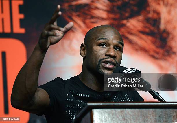 Boxer Floyd Mayweather Jr. Speaks during the final news conference for his fight with Canelo Alvarez at the MGM Grand Hotel/Casino on September 11,...
