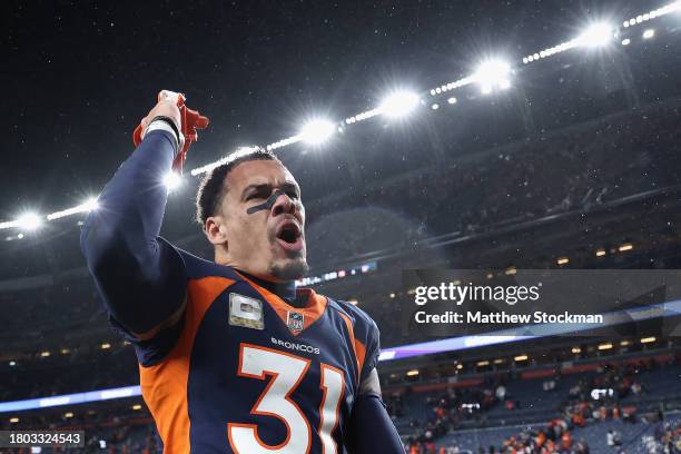 Safety Justin Simmons of the Denver Broncos celebrates after defeating the Minnesota Vikings in the NFL game at Empower Field At Mile High on...