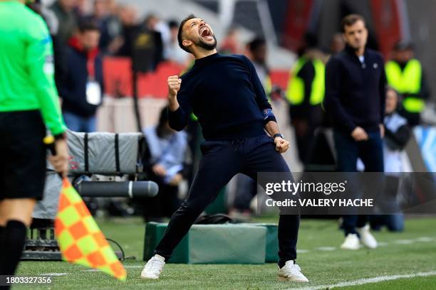 Nice's Italian head coach Francesco Farioli celebrates after winning the French L1 football match between OGC Nice and Toulouse FC at the Allianz...