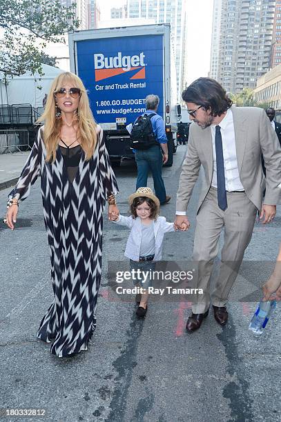 Fashion designer Rachel Zoe, Skyler Morrison Berman, and Rodger Berman leave the Mercedes-Benz Fashion Week at Lincoln Center for the Performing Arts...