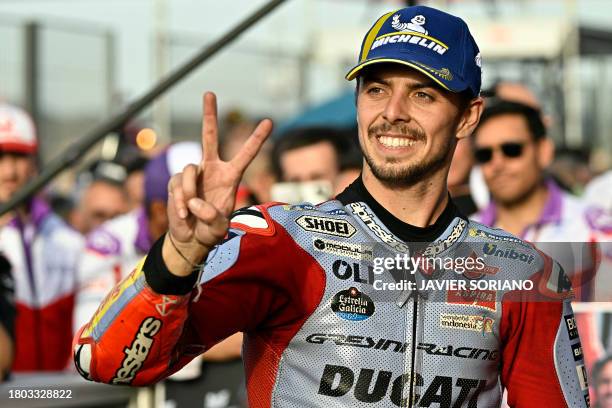 Ducati Italian rider Fabio Di Giannantonio celebrates his second place in the MotoGP Valencia Grand Prix at the Ricardo Tormo racetrack in Cheste, on...