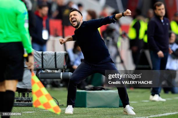 Nice's Italian head coach Francesco Farioli celebrates after winning the French L1 football match between OGC Nice and Toulouse FC at the Allianz...