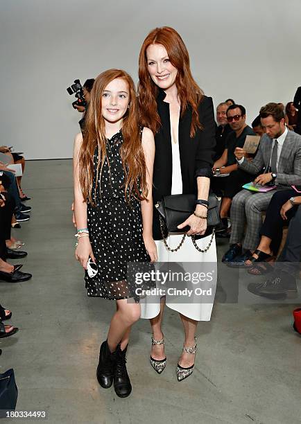 Actress Julianne Moore and her daughter Liv Helen Freundlich attend the Reed Krakoff fashion show during Mercedes-Benz Fashion Week Spring 2014 on...