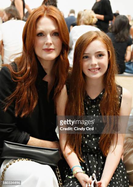 Actress Julianne Moore and her daughter Liv Helen Freundlich attend the Reed Krakoff fashion show during Mercedes-Benz Fashion Week Spring 2014 on...