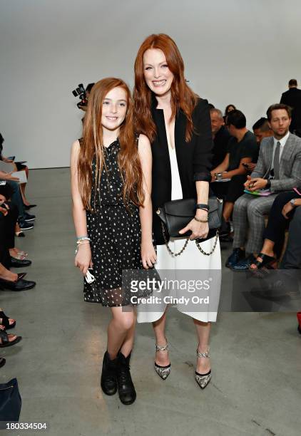Actress Julianne Moore and her daughter Liv Helen Freundlich attend the Reed Krakoff fashion show during Mercedes-Benz Fashion Week Spring 2014 on...