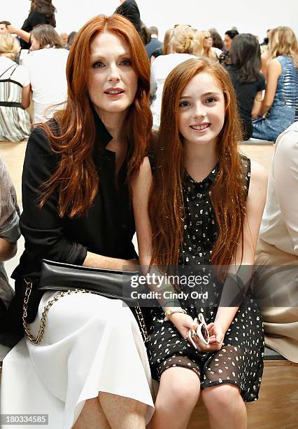 Actress Julianne Moore and her daughter Liv Helen Freundlich attend the Reed Krakoff fashion show during Mercedes-Benz Fashion Week Spring 2014 on...