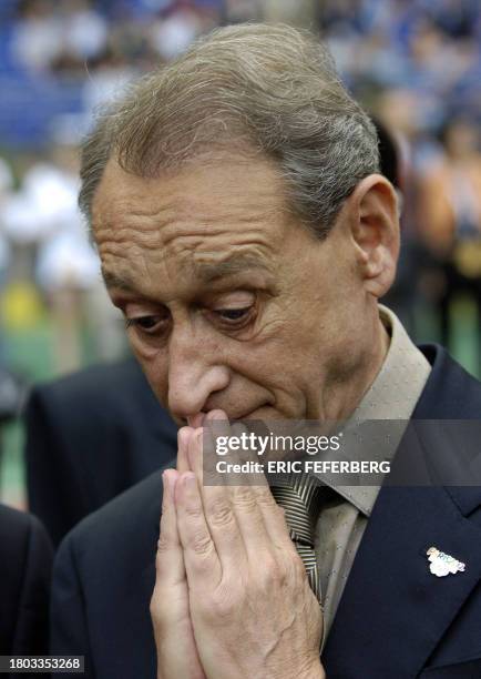 Paris' mayor Bertrand Delanoe reacts during an event organised in support of Paris' bid to host the 2012 Olympic Games, at the Stade de France, 01...