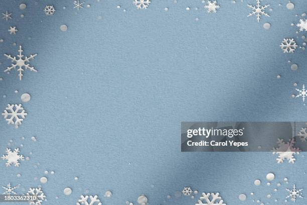 snowflakes frame in  pastel blue paper cut - origami background stock pictures, royalty-free photos & images