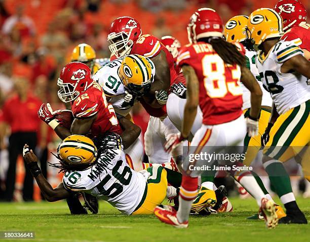 Running back Cyrus Gray of the Kansas City Chiefs carries the ball during the preseason game against the Green Bay Packers at Arrowhead Stadium on...