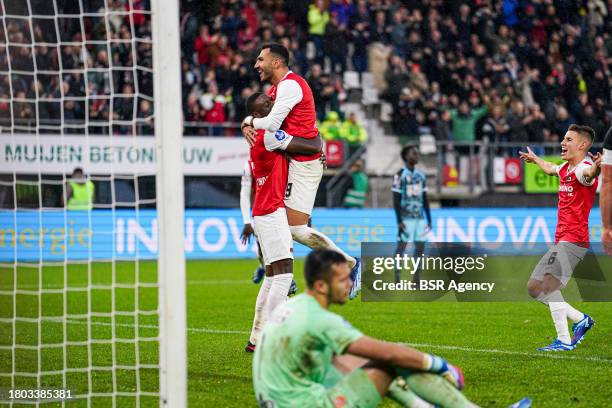 Bruno Martins Indi of AZ, Vangelis Pavlidis of AZ, players of AZ celebrate the third goal during the Dutch Eredivisie match between AZ and FC...