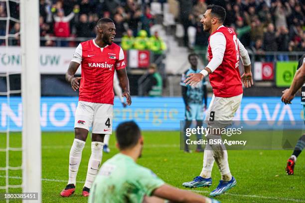 Bruno Martins Indi of AZ, Vangelis Pavlidis of AZ, players of AZ celebrate the third goal during the Dutch Eredivisie match between AZ and FC...