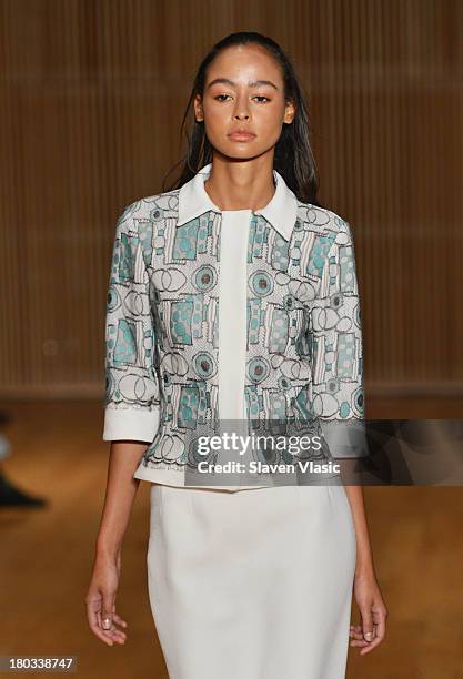 Model walks the runway at the Douglas Hannant fashion show during Mercedes-Benz Fashion Week Spring 2014 at the DiMenna Center on September 11, 2013...