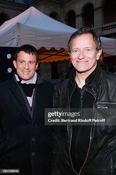 Politician Manuel Valls and Stage Director of the Opera Francis Huster attend 'Opera En Plein Air' : Gala with 'La flute enchantee' by Mozart play at...