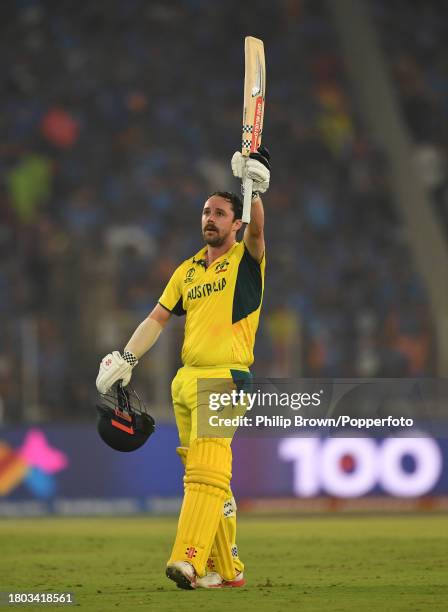 Travis Head of Australia reaches his century during the ICC Men's Cricket World Cup India 2023 Final between India and Australia at Narendra Modi...