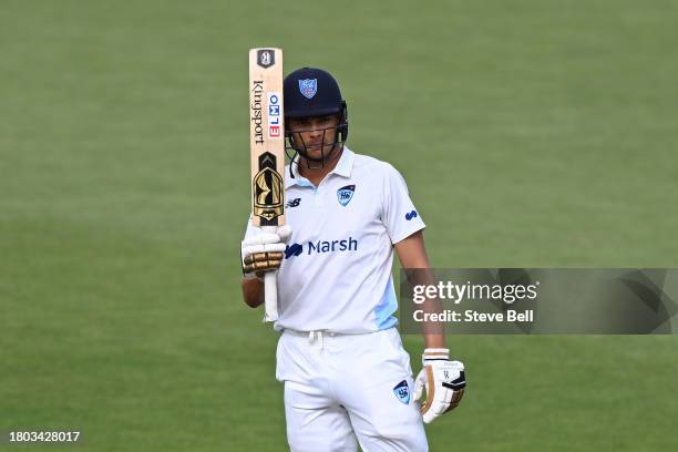 Chris Green of the Blues celebrates scoring a half century during the Sheffield Shield match between Tasmania and New South Wales at Blundstone...