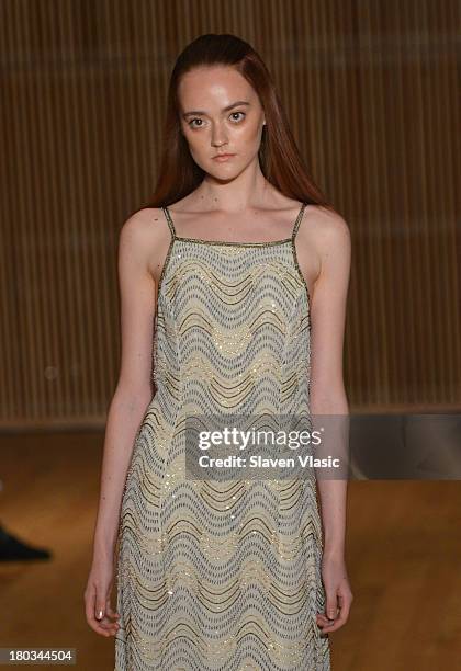 Model walks the runway at the Douglas Hannant fashion show during Mercedes-Benz Fashion Week Spring 2014 at the DiMenna Center on September 11, 2013...