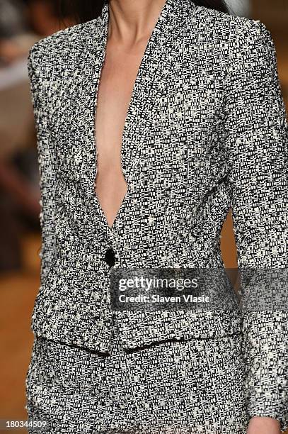 Model walks the runway at the Douglas Hannant fashion show during Mercedes-Benz Fashion Week Spring 2014 at the DiMenna Center on September 11, 2013...