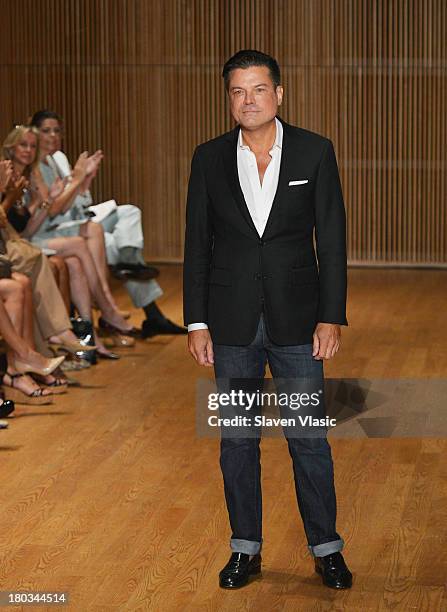 Designer Douglas Hannant walks the runway at the Douglas Hannant fashion show during Mercedes-Benz Fashion Week Spring 2014 at the DiMenna Center on...