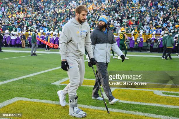 Joey Bosa of the Los Angeles Chargers leaves the field following a game against the Green Bay Packers at Lambeau Field on November 19, 2023 in Green...