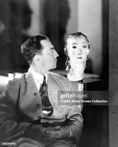 Dummy head appears to wink at American comic actor and filmmaker Buster Keaton , circa 1925.