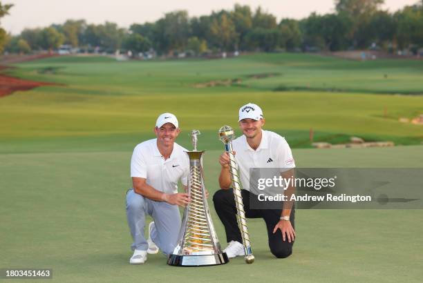 Race to Dubai Winner, Rory McIlroy of Northern Ireland and DP World Tour Championship Winner, Nicolai Hojgaard of Denmark pose with their trophies on...