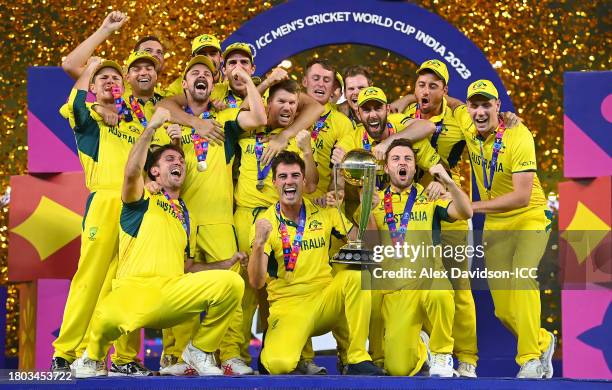 Pat Cummins of Australia lifts the ICC Mens Cricket World Cup 2023 Trophy after victory in the ICC Men's Cricket World Cup India 2023 Final between...