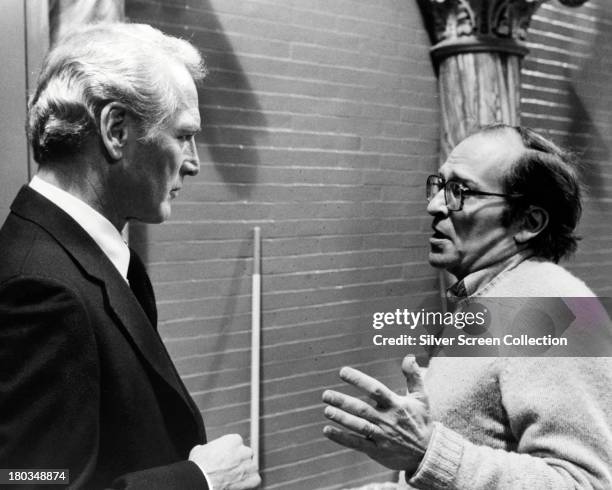 American actor Paul Newman with director Sidney Lumet on the set of 'The Verdict', 1982.