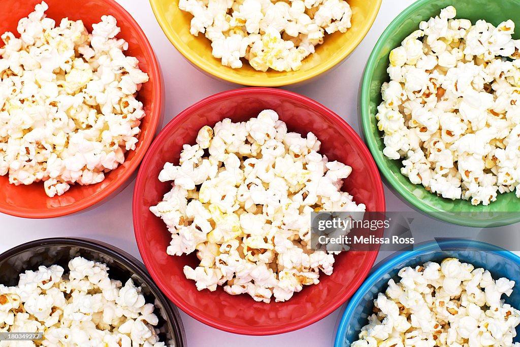 Popcorn in rainbow bowls.