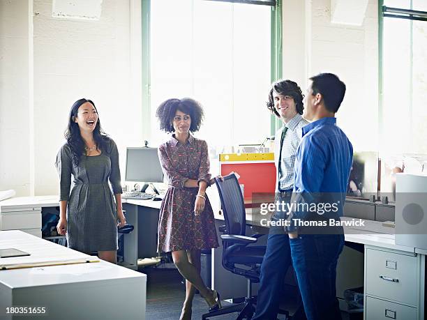 group of colleagues in discussion in office - 2013newwomen stock pictures, royalty-free photos & images