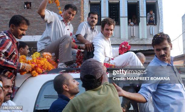 Rahul Gandhi, son of President of the Congress Party and Chairperson of the United Progressive Alliance Government Sonia Gandhi extends his hand...